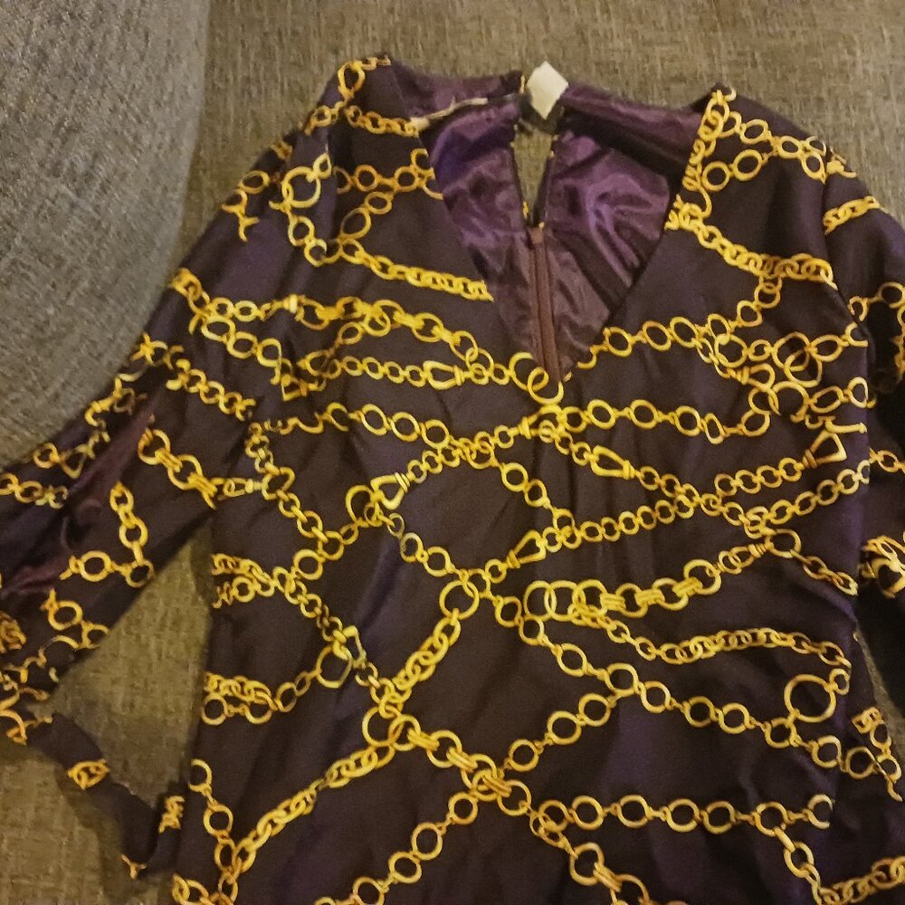 Purple and gold dress with chain design